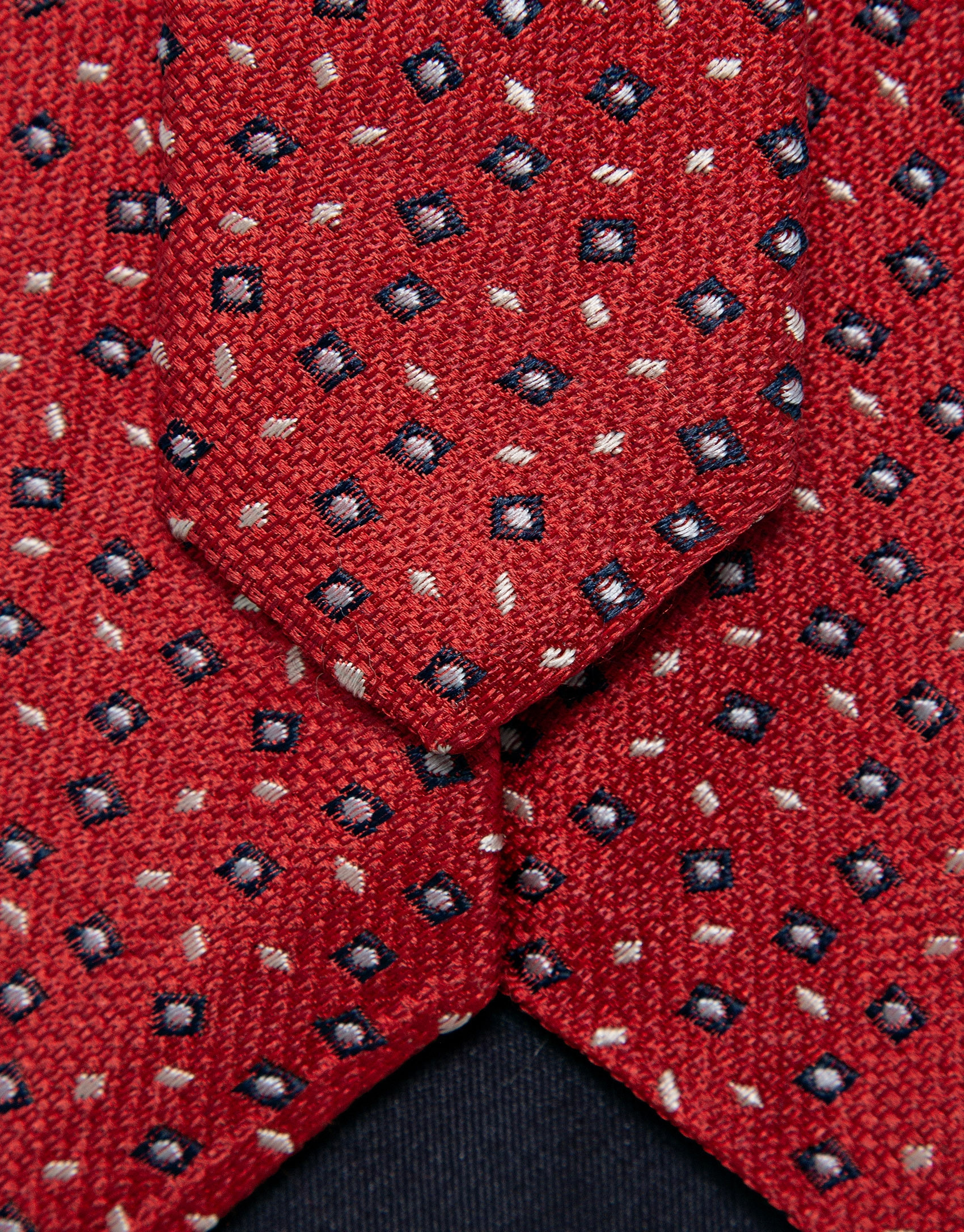 Red silk tie with navy/white geometric ... | Roberto Verino
