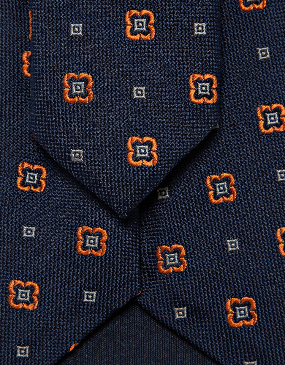 Navy silk tie with geometric orange flower ... | Roberto Verino