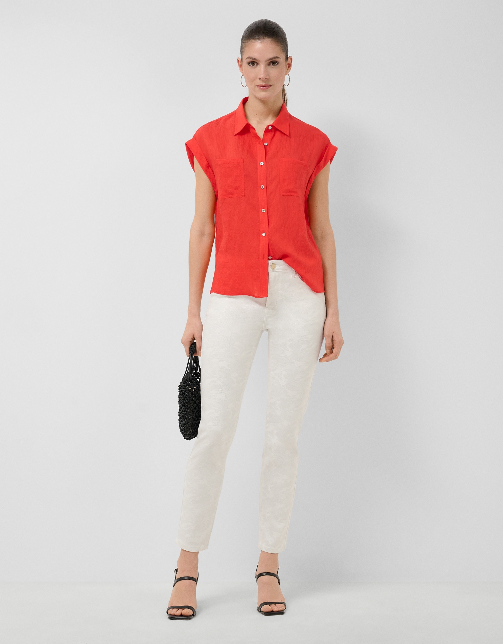 Sleeveless blouse with pockets in red - Woman | Roberto Verino