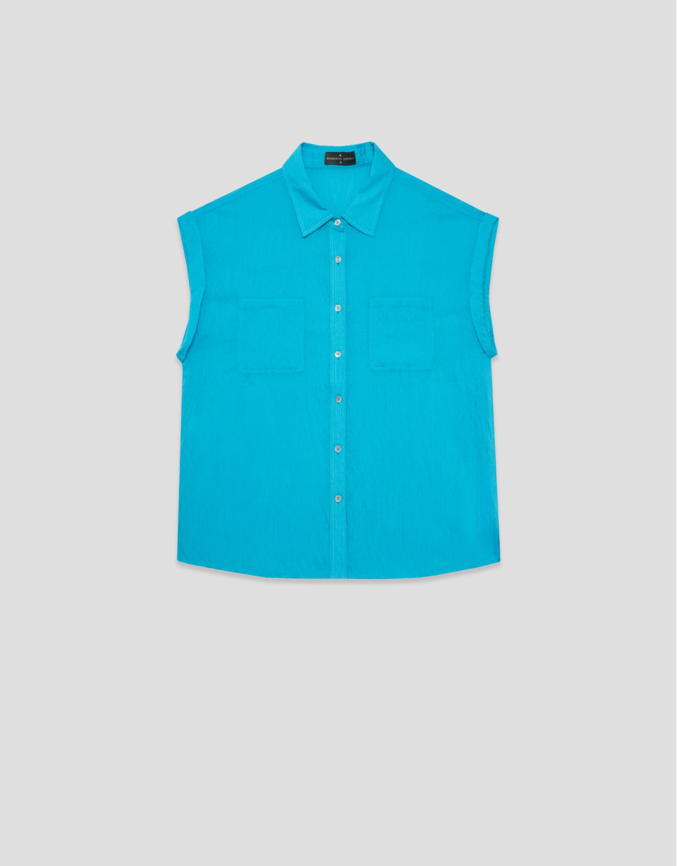 Blusa sin mangas y con bolsillos azul turquesa | Roberto Verino