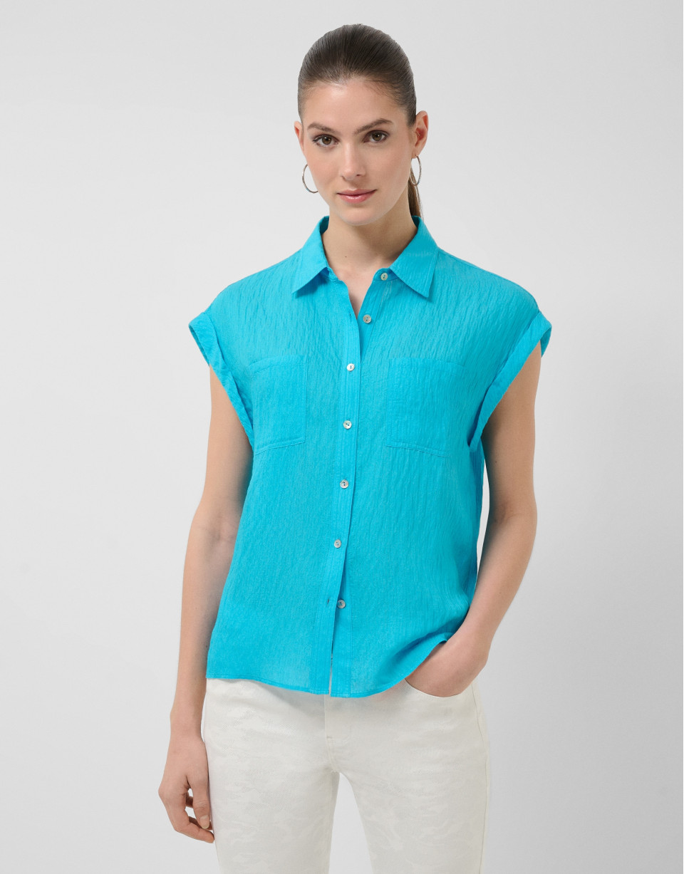 Turquoise sleeveless blouse with pockets | Roberto Verino