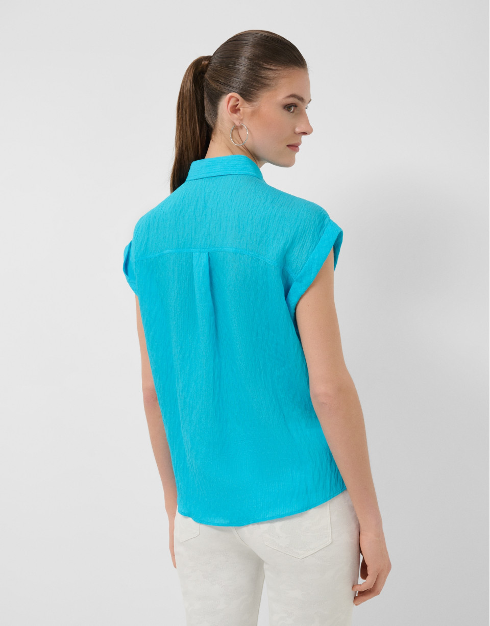 Turquoise sleeveless blouse with pockets | Roberto Verino