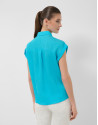 Blusa sin mangas y con bolsillos azul turquesa | Roberto Verino