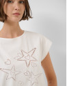 Oversized white sleeveless T-shirt with stars... | Roberto Verino