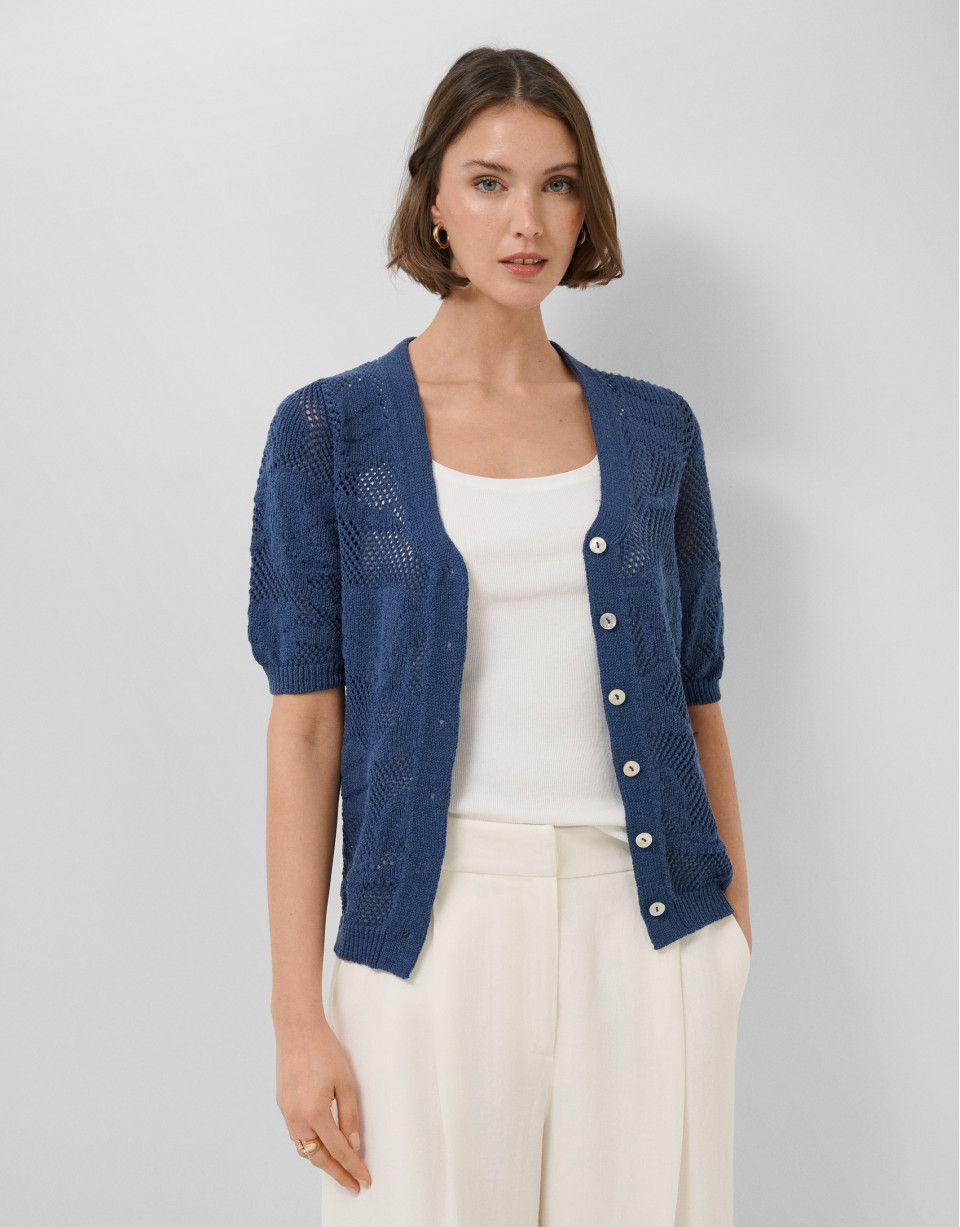 Chaqueta manga corta con calados florales ... | Roberto Verino