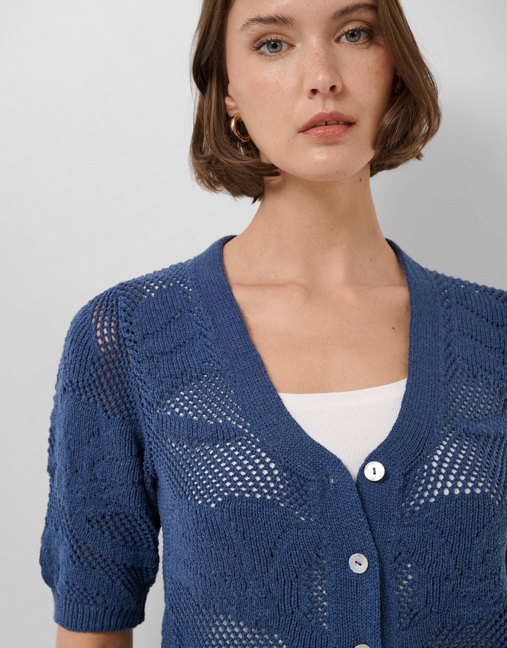 Short-sleeved jacket with navy blue floral ... | Roberto Verino