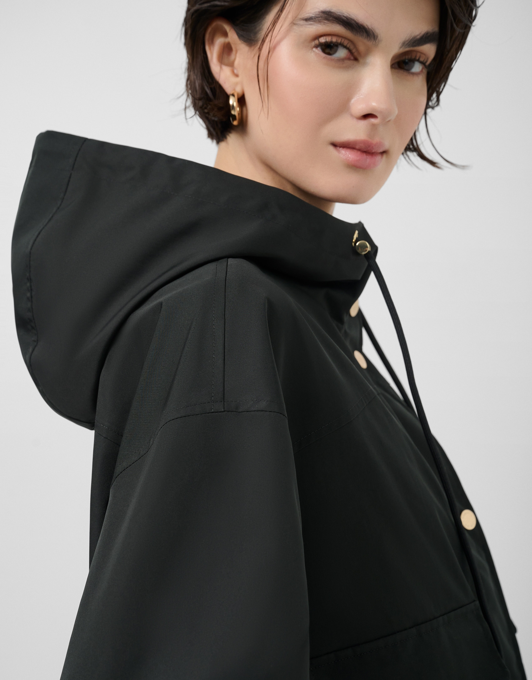 Black technical fabric jacket with camel ... | Roberto Verino