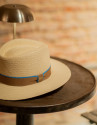 Ecru plant fibre hat with camel ribbon - Woman | Roberto Verino