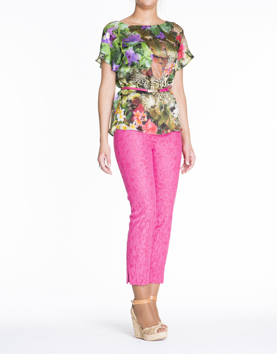 Loose green floral print silk blouse.