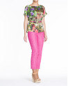 Loose green floral print silk blouse.