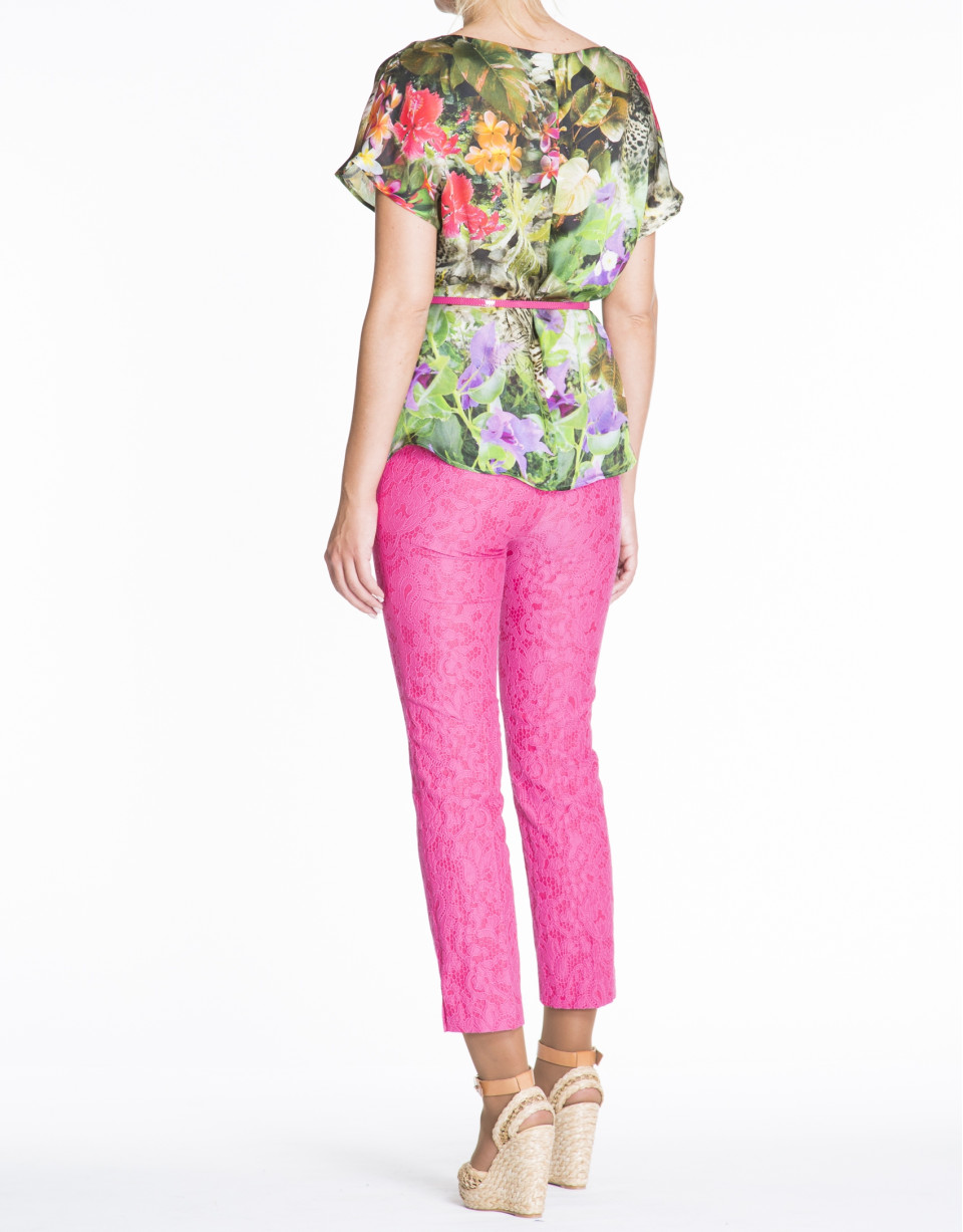 Loose green floral print silk blouse.
