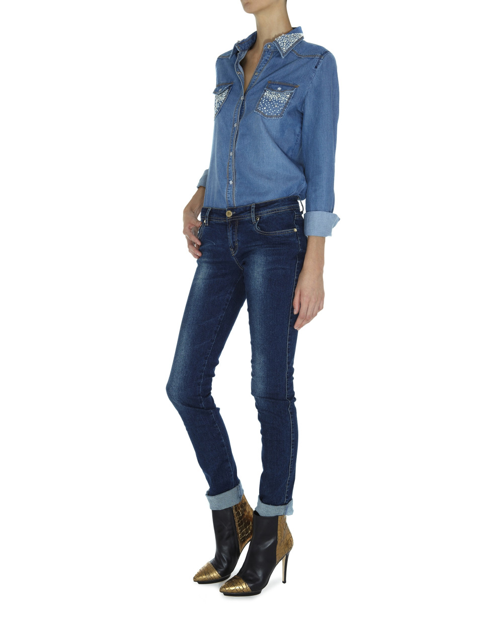 Faded jeans with gold embroidery on pockets
