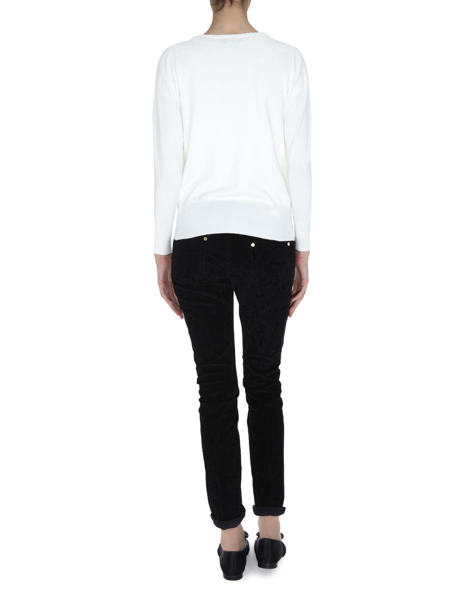 White jacket with pearls on neckline