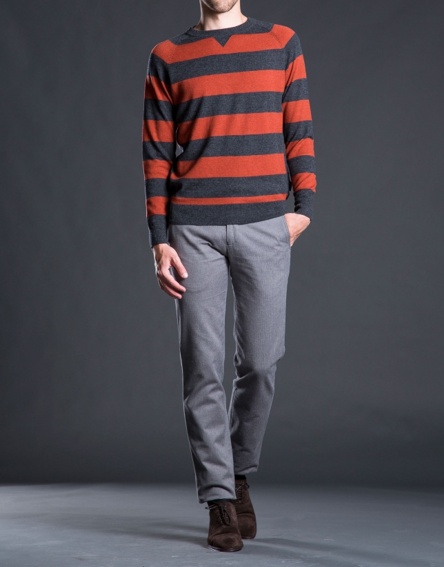 Gray and orange striped knit sweater with elbow patches
