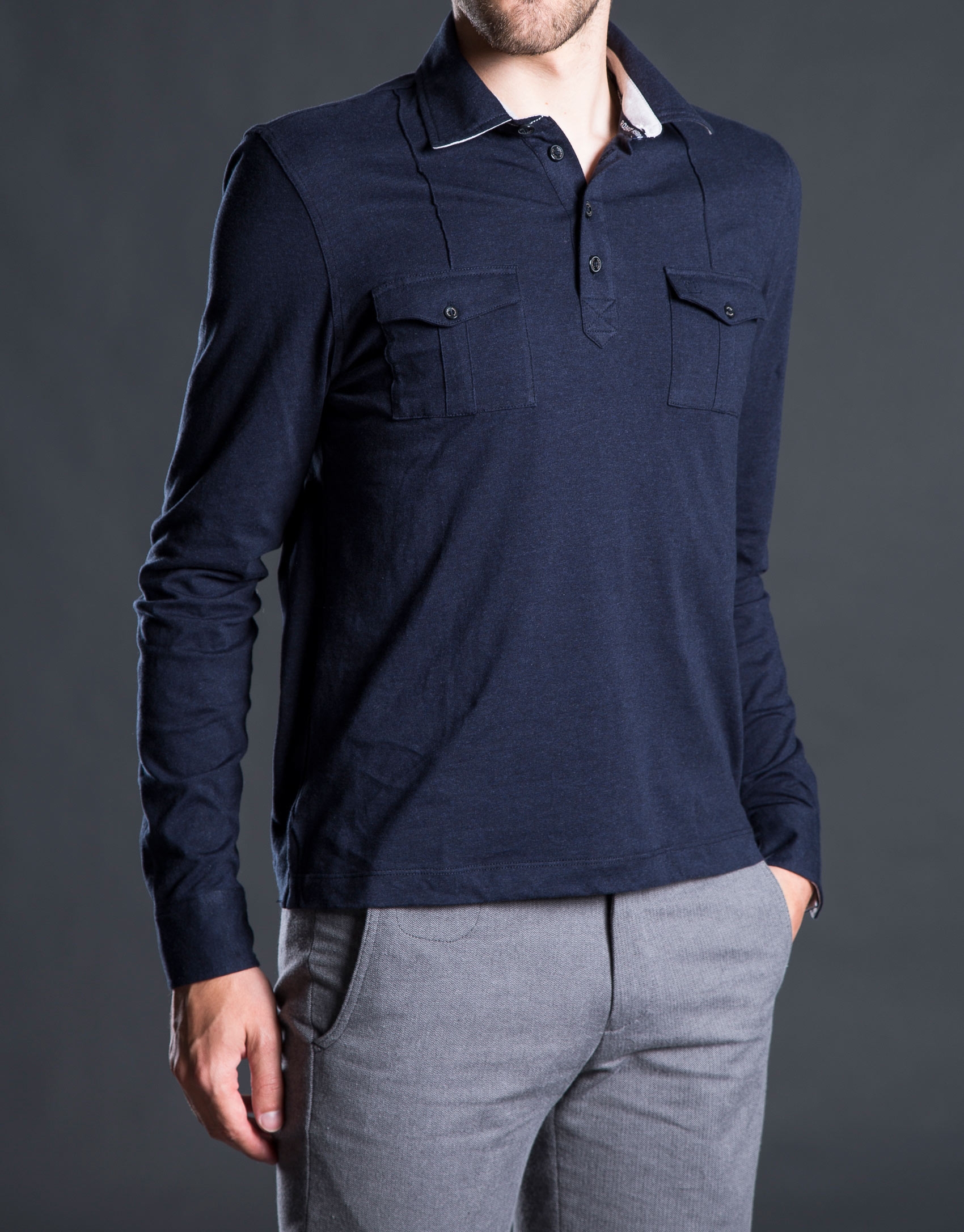 Blue polo shirt with breast pockets