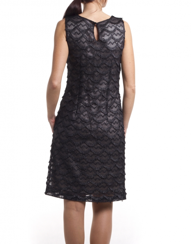 Dress with overlapping sheer pattern