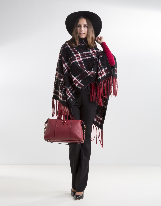 Red fringed poncho