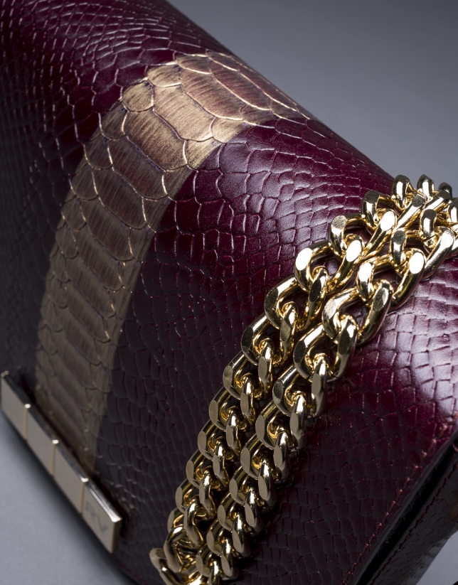 Burgundy leather Alicia Andromeda bag  with embossed snake and old gold stripe