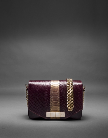 Burgundy leather Alicia Andromeda bag  with embossed snake and old gold stripe