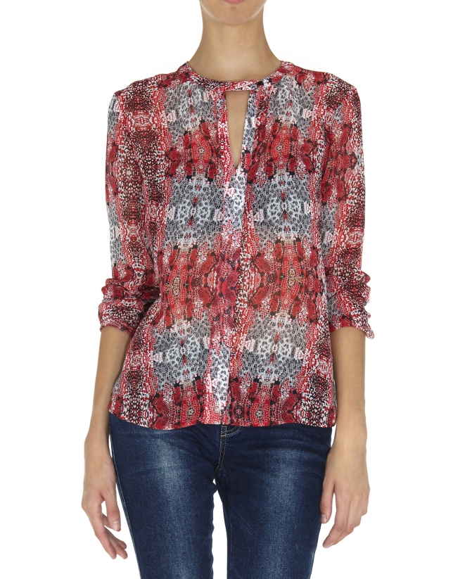 Red print V-neck blouse with tuckered cuffs