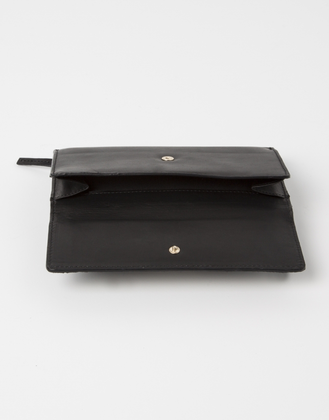 Black wallet with brown fur.