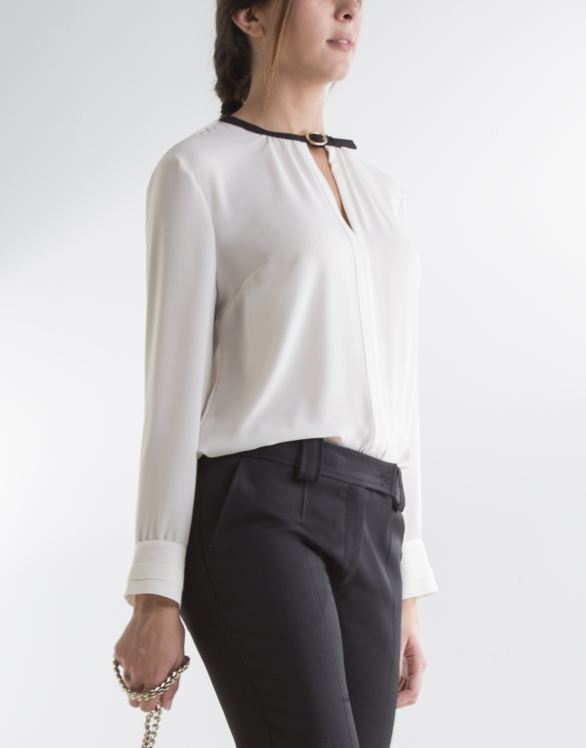 Beige blouse with buckle