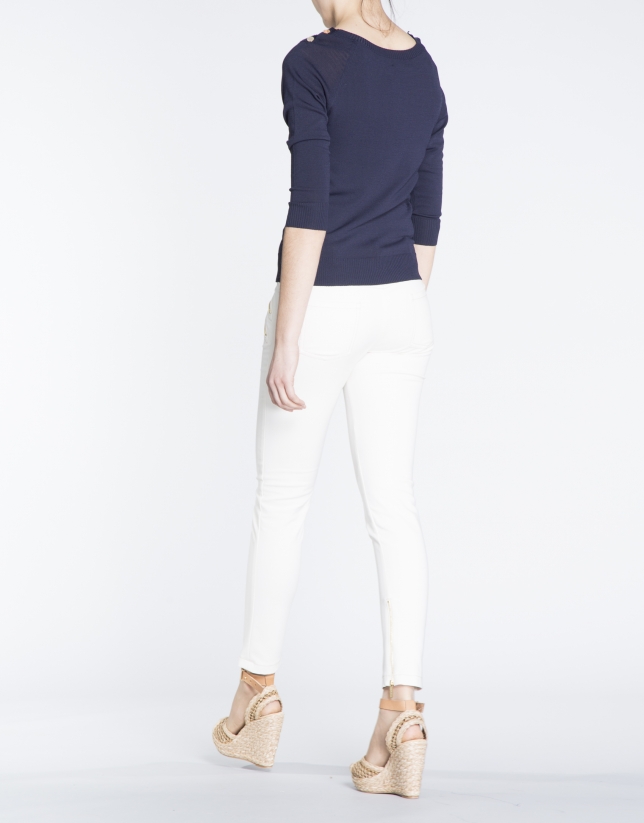 Navy blue boat neck sweater with gold buttons