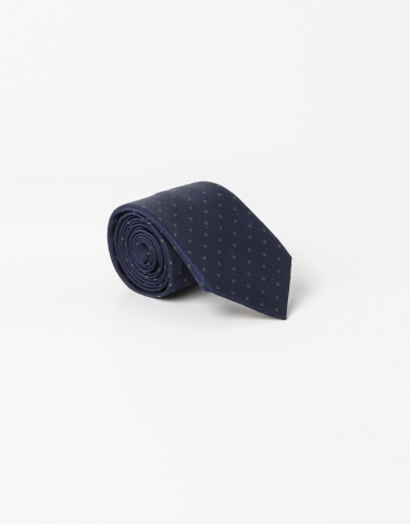 Navy blue tie with green dots