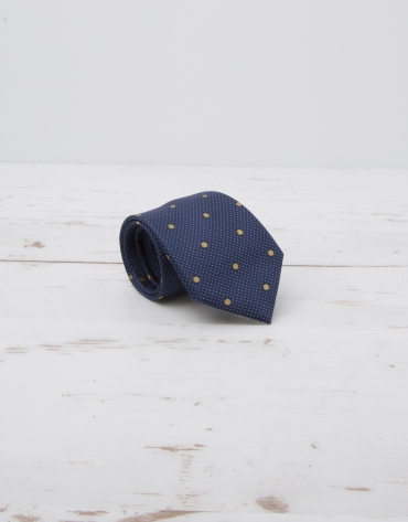 Navy blue tie with large yellow dots