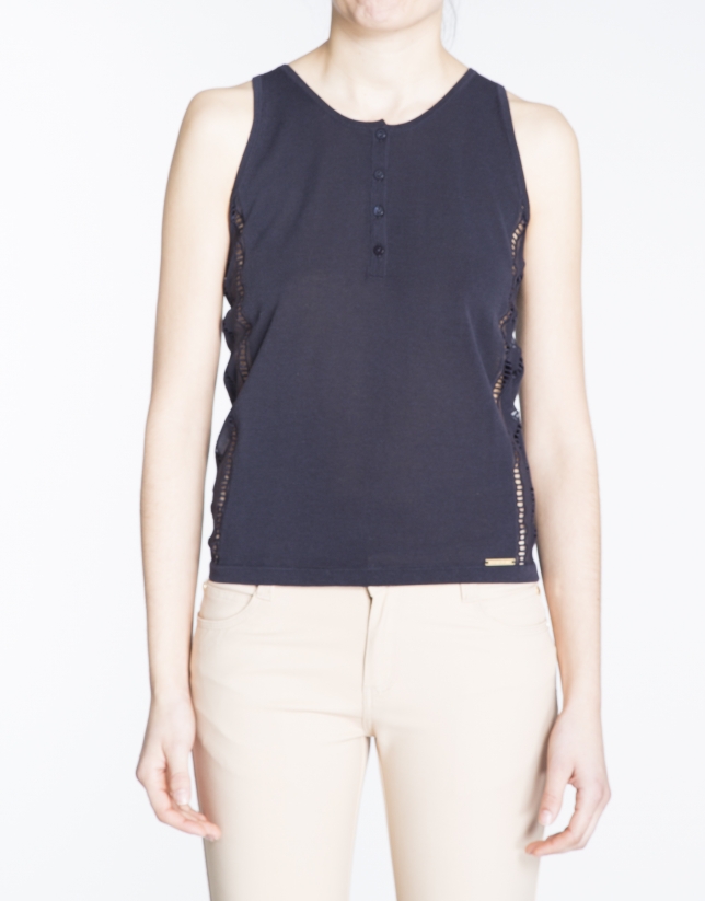 Navy blue knit top with passementerie on sides