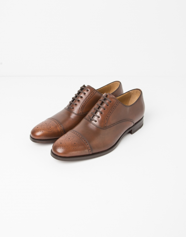 Brown Oxford dress shoes