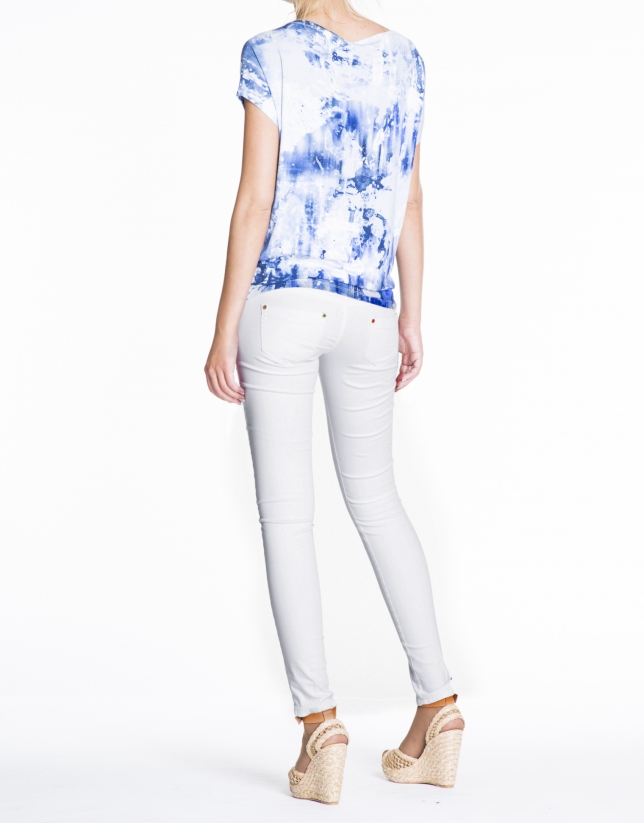 Loose white top with blue print