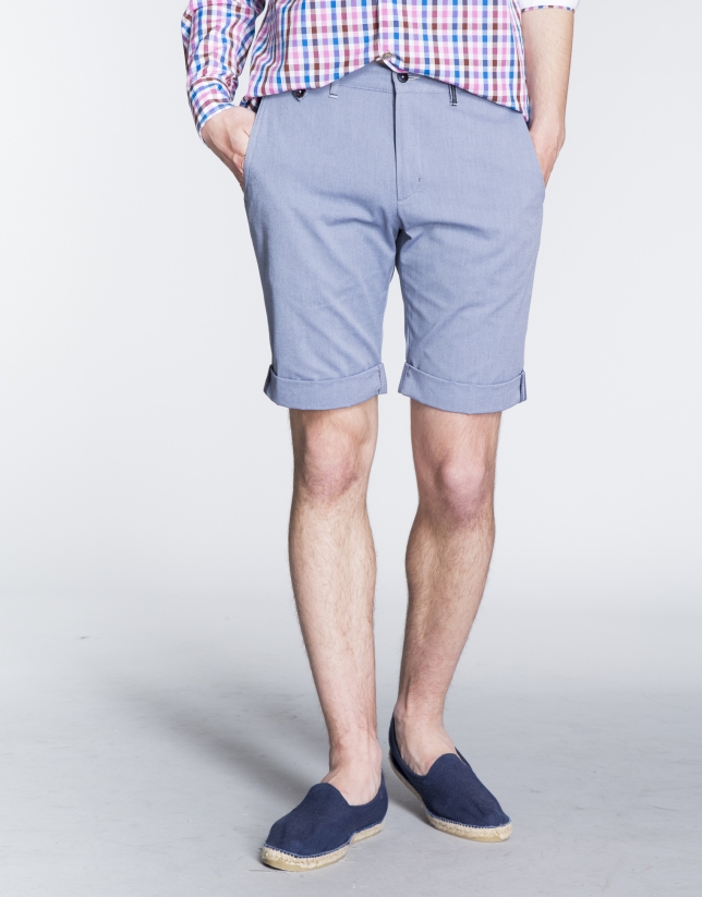 Blue herringbone cotton Bermuda shorts.