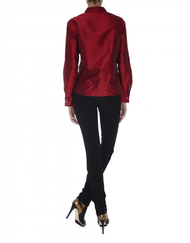 Red long-sleeved silk blouse