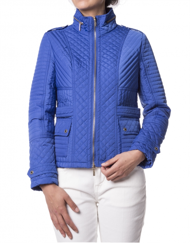 Short quilted blue jacket 