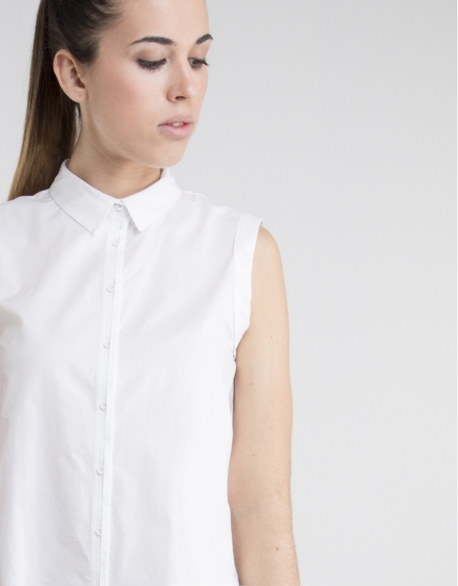 Sleeveless white shirt