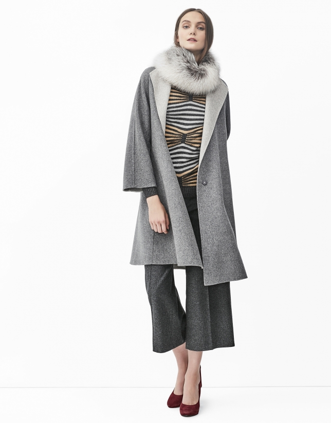 Grey sweater with geometric design