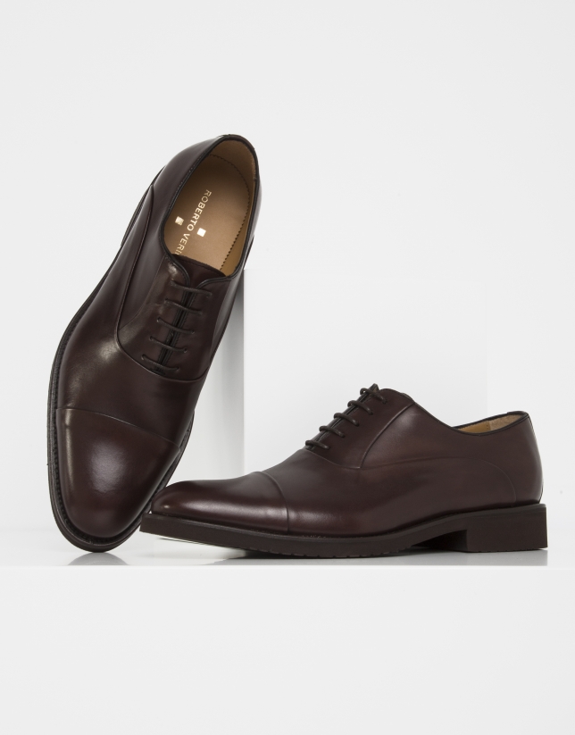 Brown shoes with slits