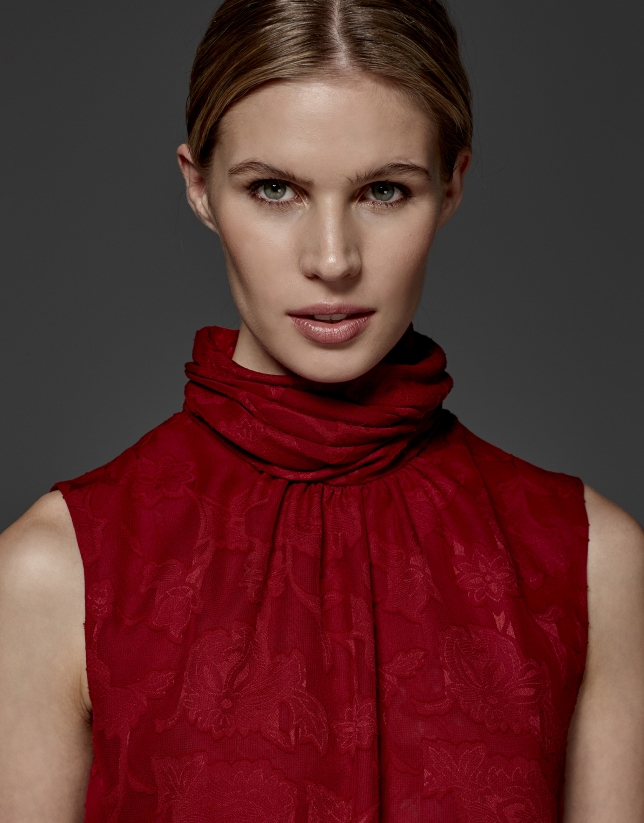 Maroon top with high draped collar