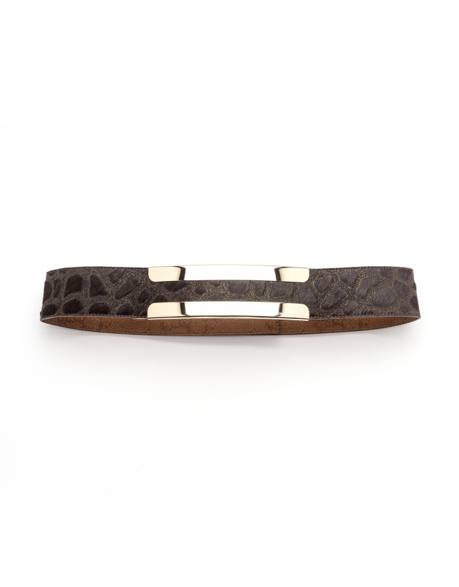 Brown belt with decorative metal pieces