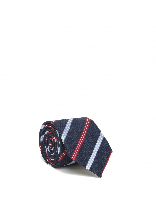 Red and white striped tie