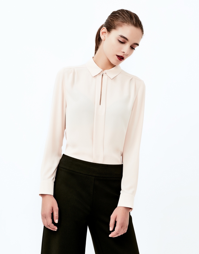 Beige shirt with central pleat