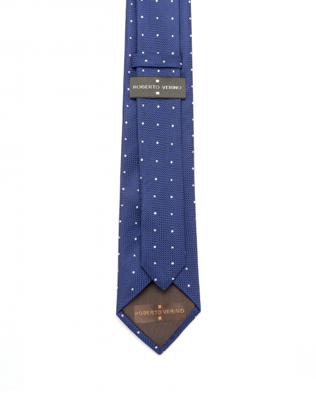 Blue and white polka dot tie