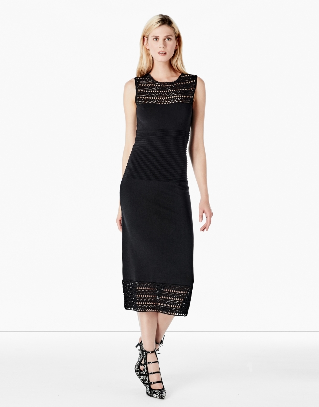 Long black knit dress with openwork