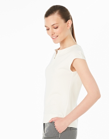 Cream-colored sleeveless top