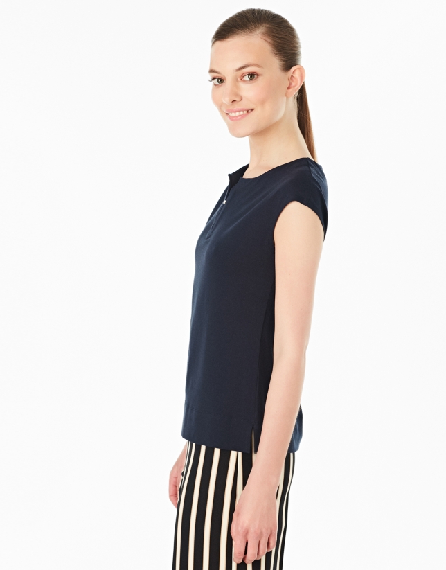 Navy blue-colored sleeveless top
