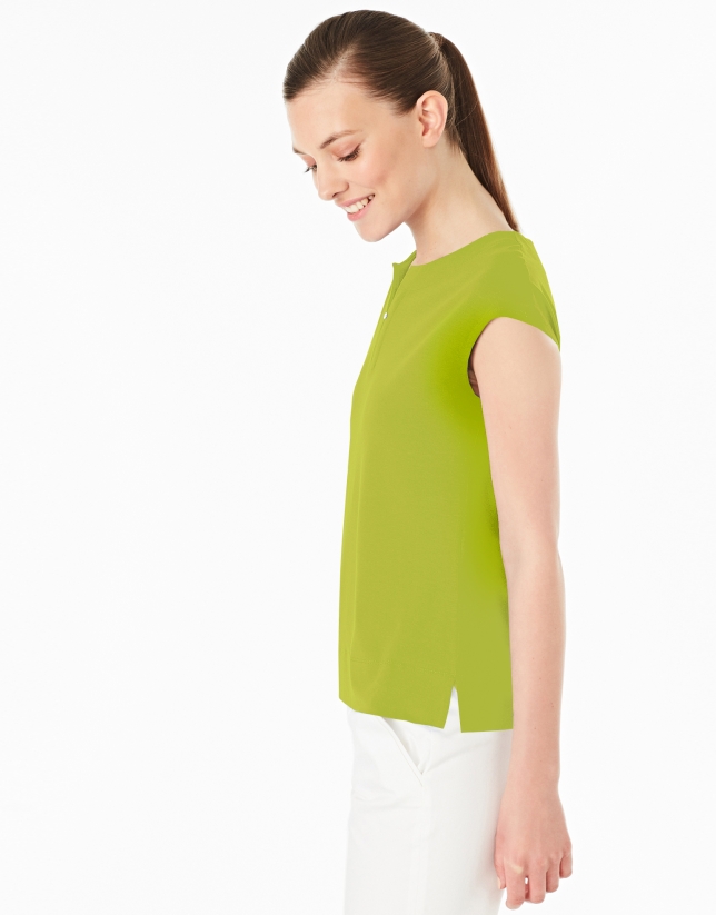 Pistachio green-colored sleeveless top