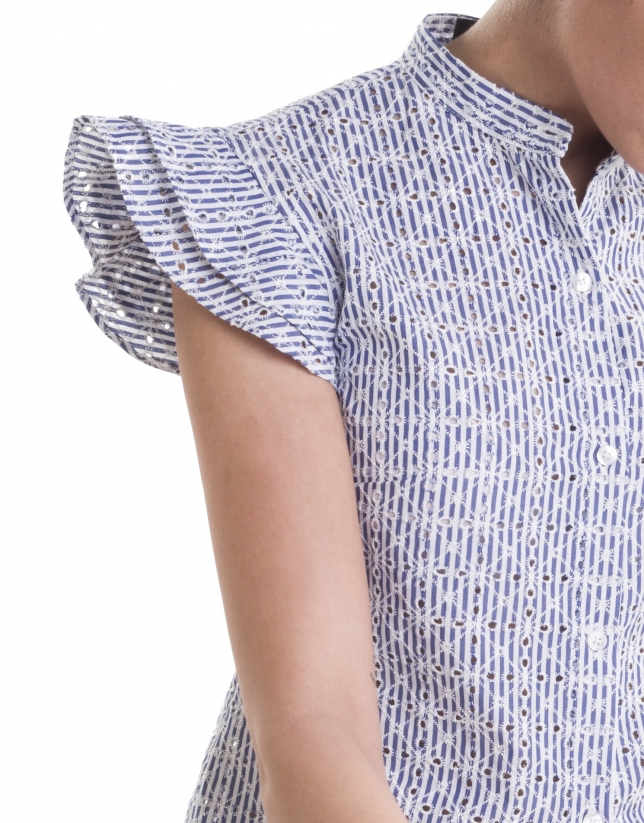 Blue embroidered shirt with flounces
