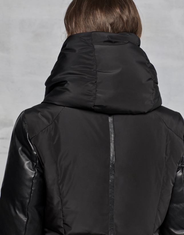 Black ski jacket with leather sleeves