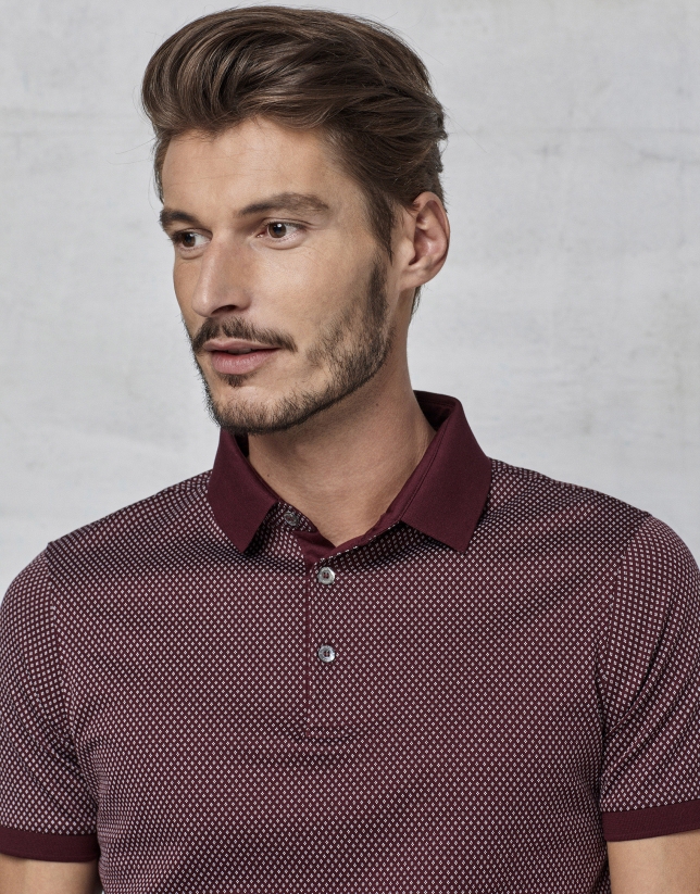 Maroon  short sleeved polo with white design